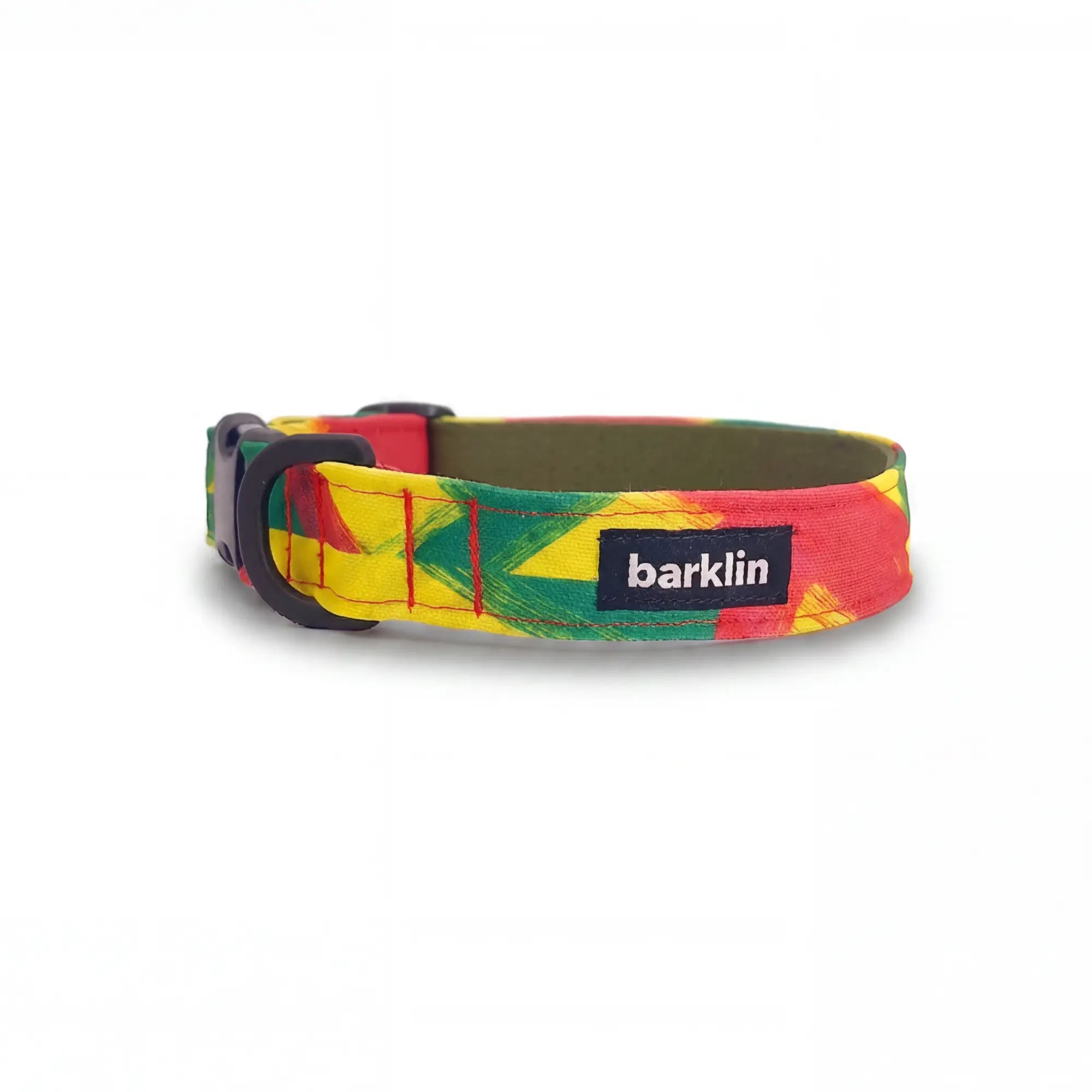 Dog collar in Barklin Rhythm pattern, standard 2.5 cm width, shown in front arc view with stitched textile surface, inner webbing, and matte black buckle hardware.